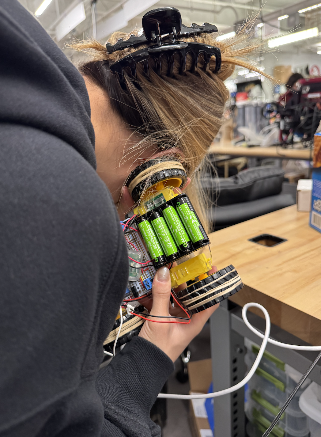 Sarah listening for a heartbeat on V1 of the car